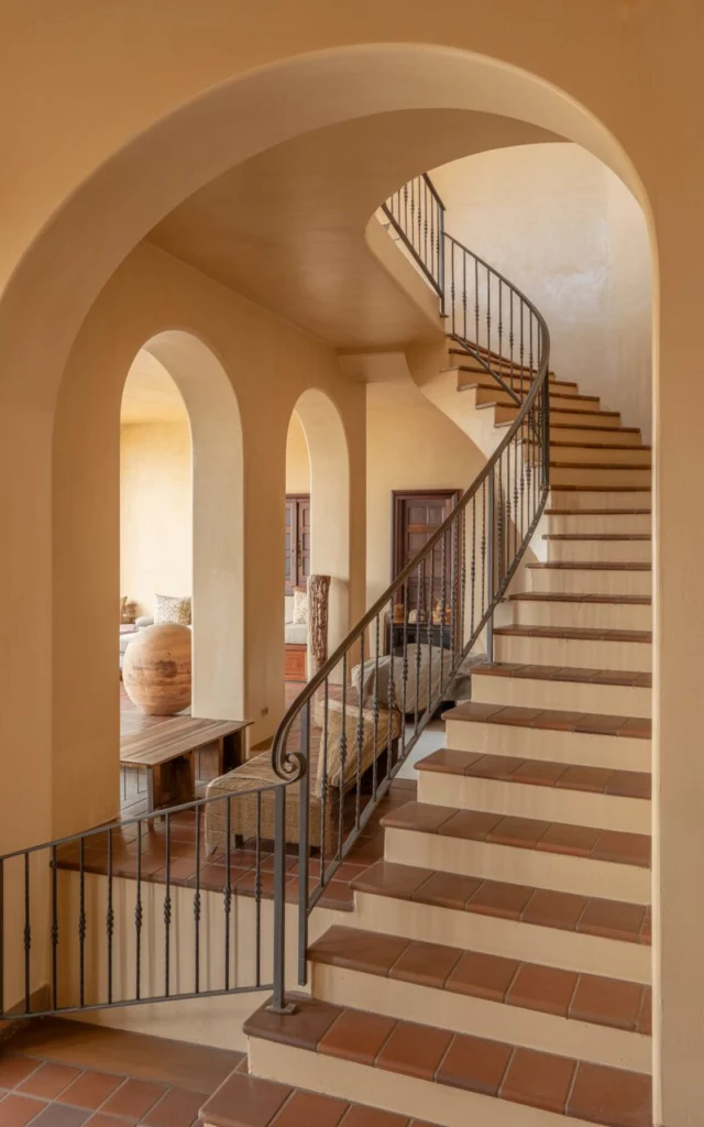 Pair curves with arched doorways nearby