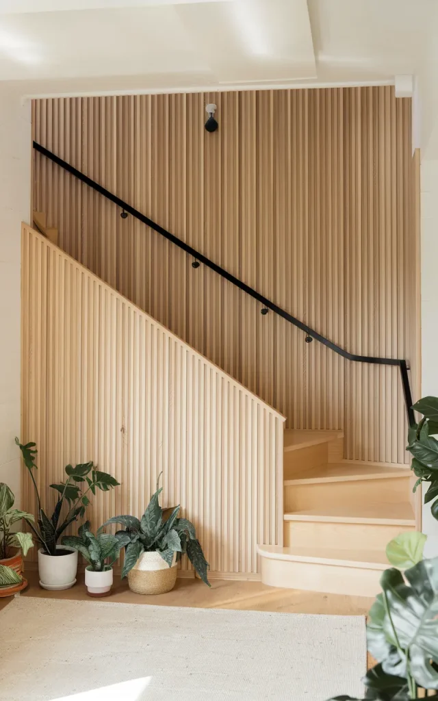 Install vertical wall paneling for instant texture